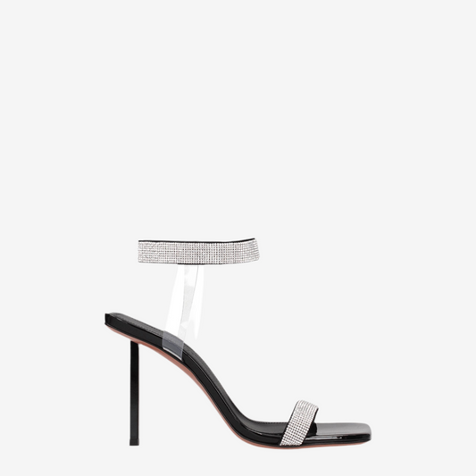 Amina Muaddi – Rih Sandals in Black Patent & Crystal