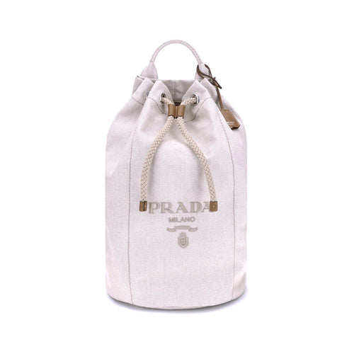 White drawstring bag with gold accents and 'Prada' branding on a white background