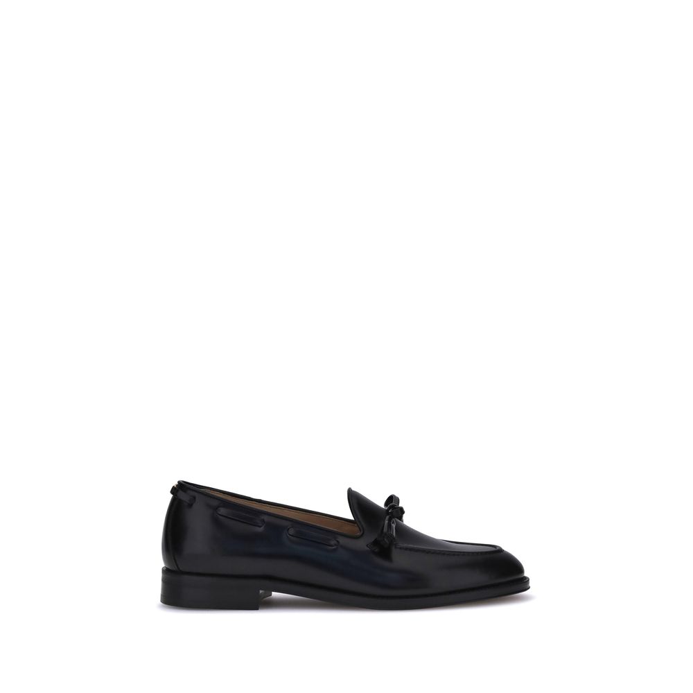 Black loafer shoe on a white background