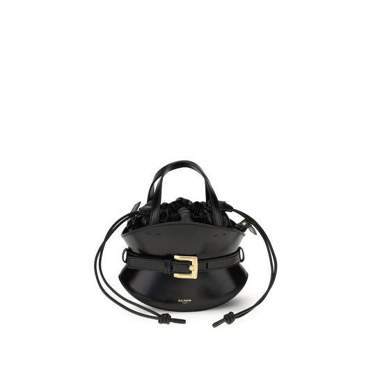 Black handbag with gold buckle on a white background