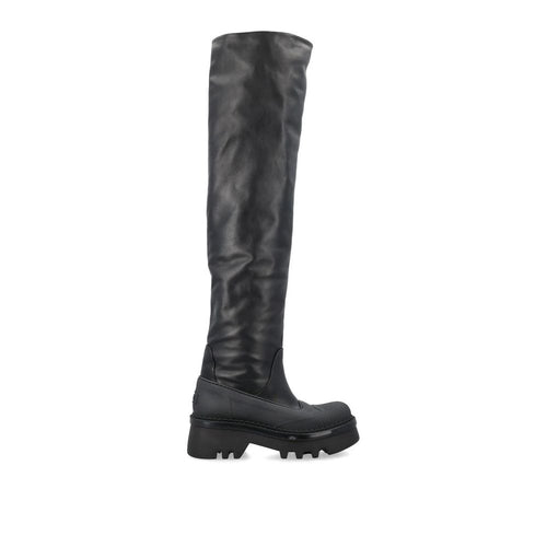 Black knee-high boot on a white background