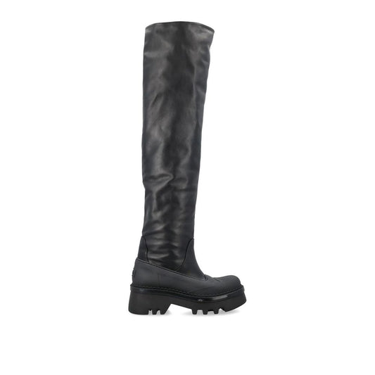 Black knee-high boot on a white background