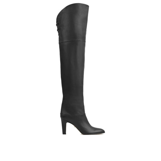 Black knee-high boot on a white background