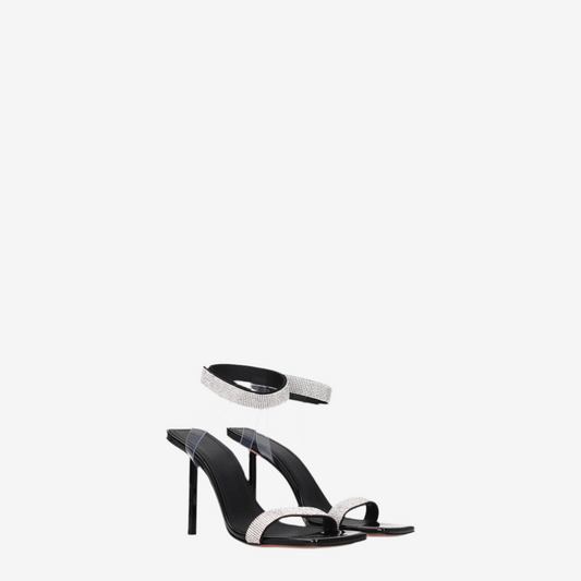 Amina Muaddi – Rih Sandals in Black Patent & Crystal
